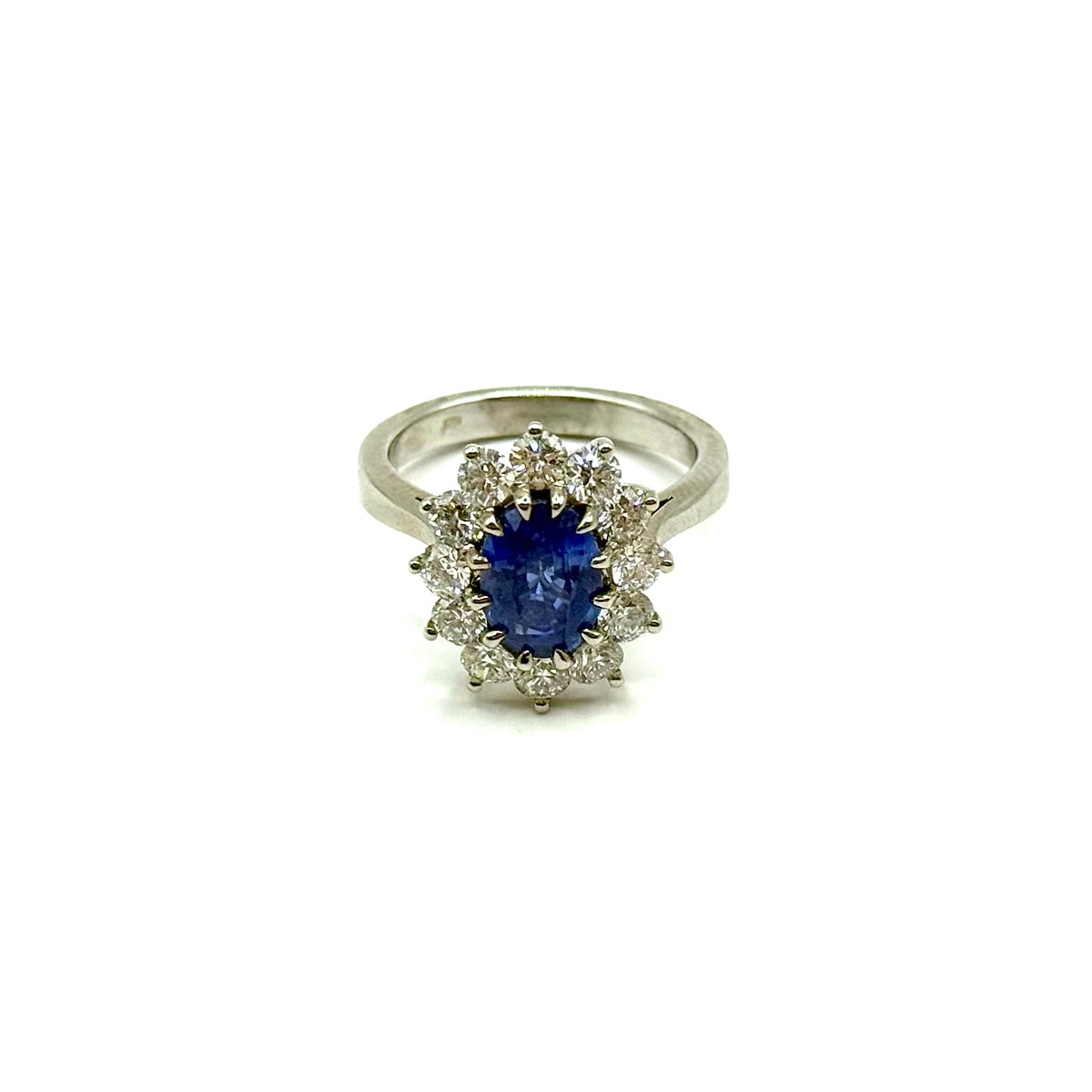 R279. Moderno anello in oro bianco con diamante e zaffiro.