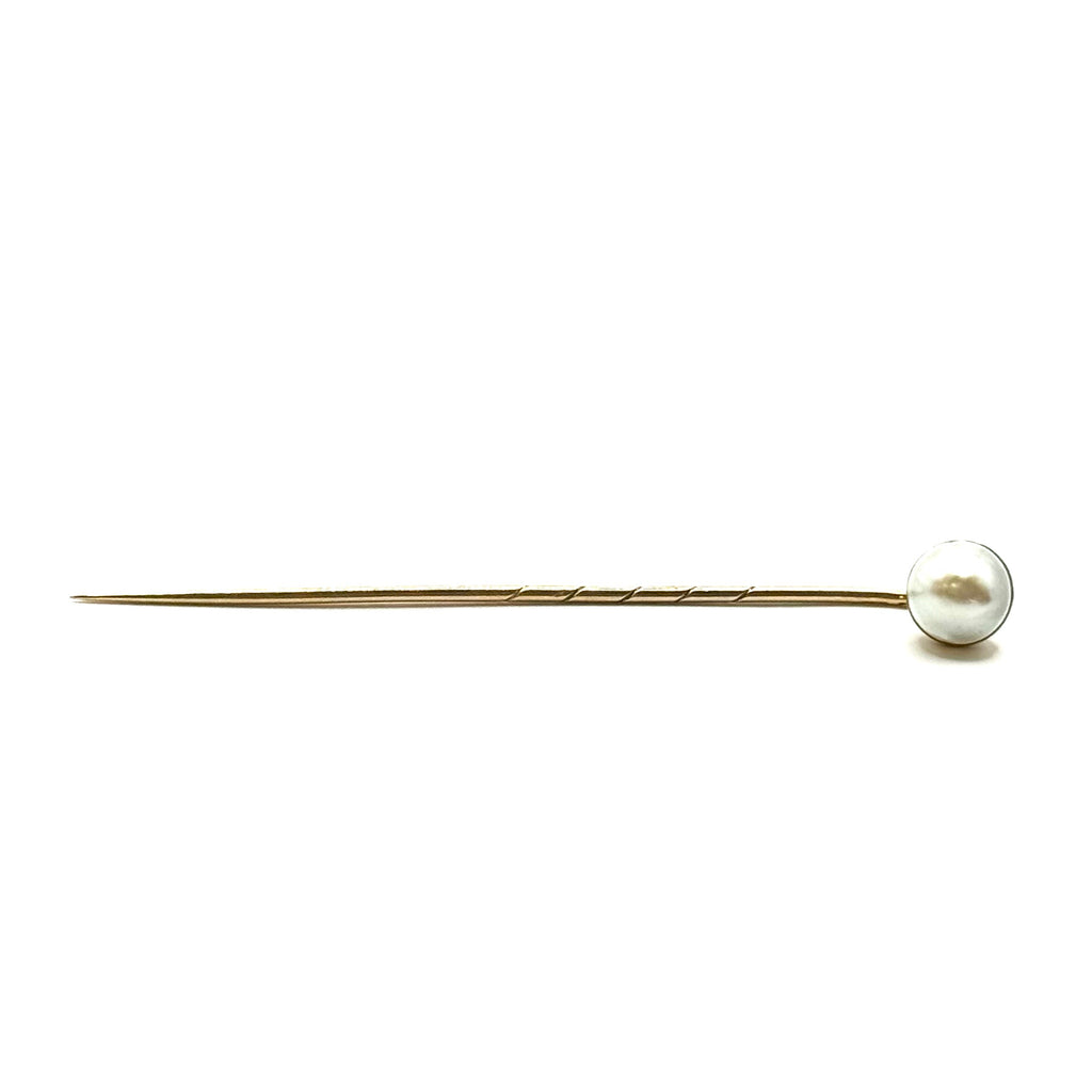 SF675. Antica spilla in oro con perla.
