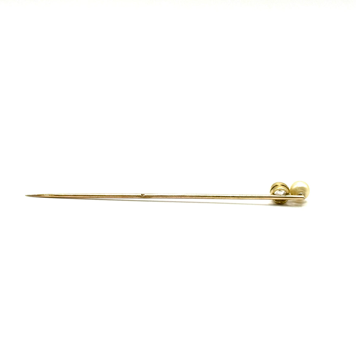 SF676. Spilla in oro Art Déco con diamante e perla.