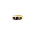 5164. Art Deco gold ring with diamonds and blue sapphire.