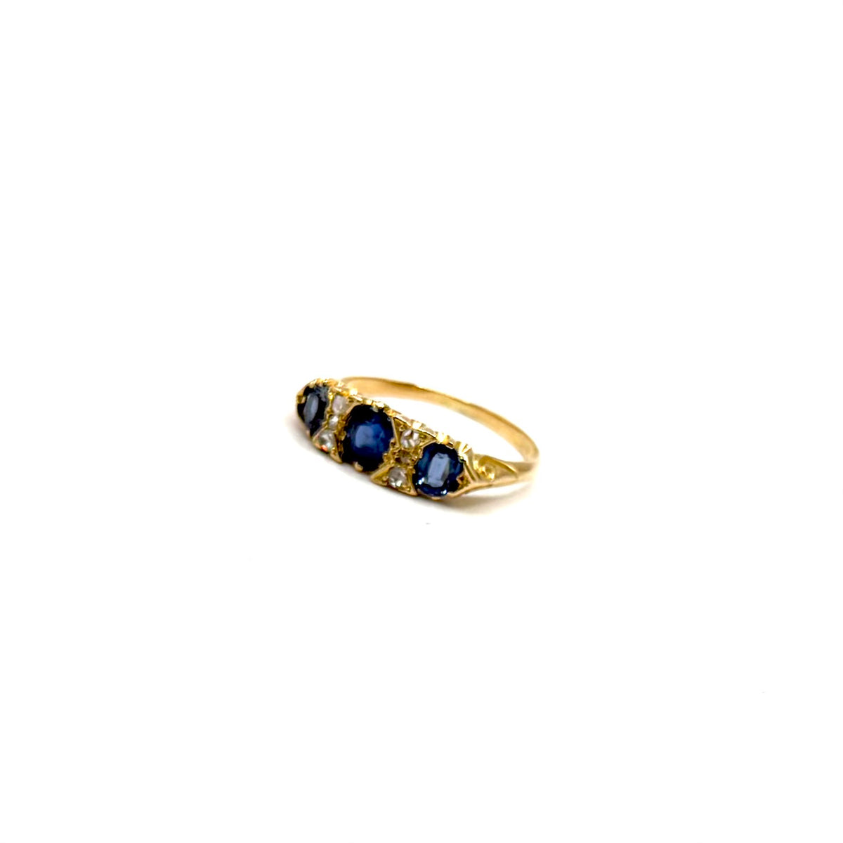 5164. Art Deco gold ring with diamonds and blue sapphire.