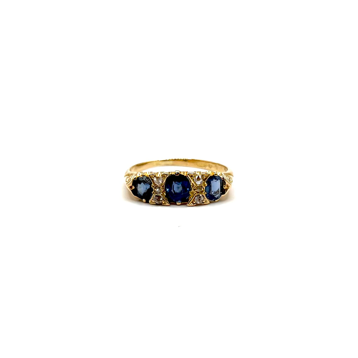 5164. Art Deco gold ring with diamonds and blue sapphire.