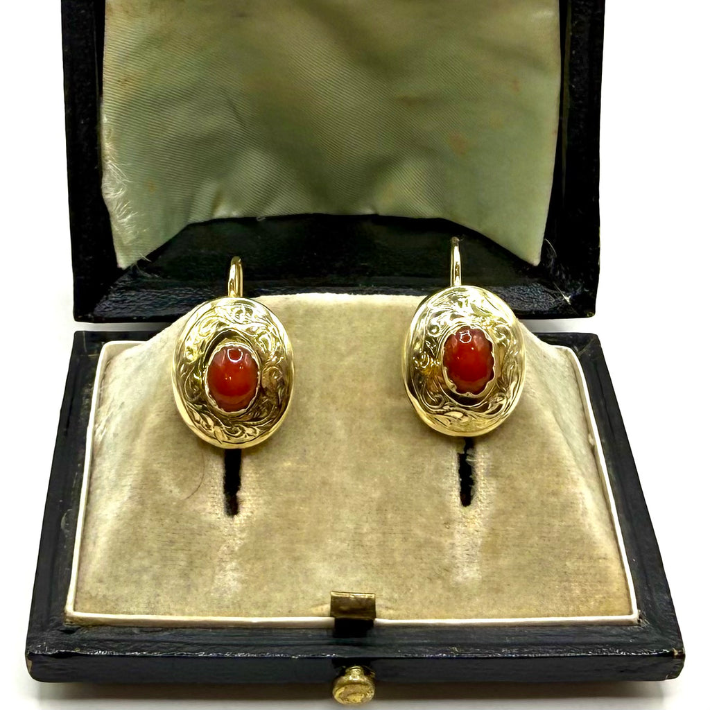 Art Deco gold earrings with coral.